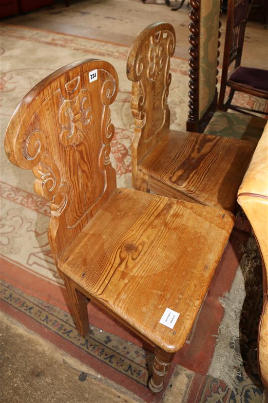 A pair of Victorian pine hall chairs